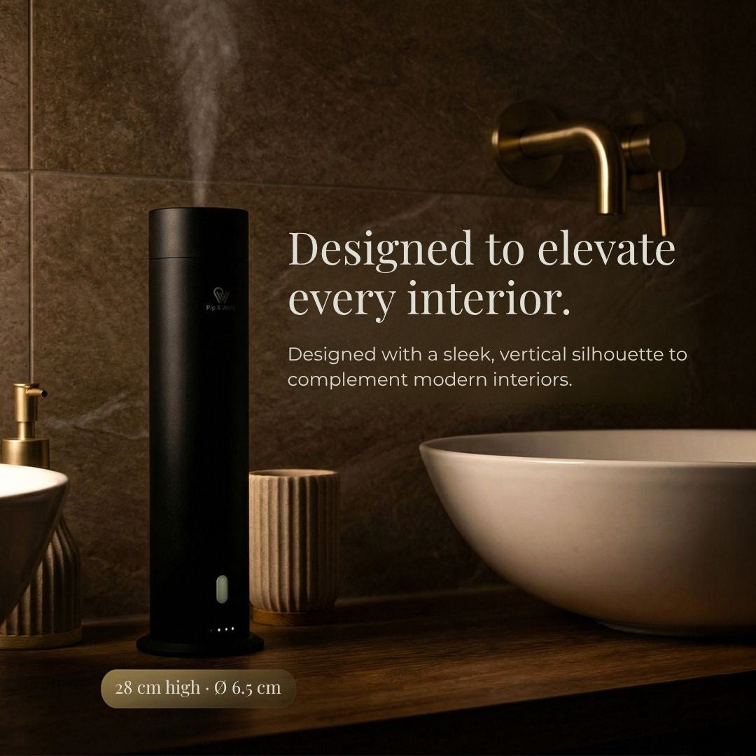 Black cylindrical device on a bathroom counter with text about interior design.