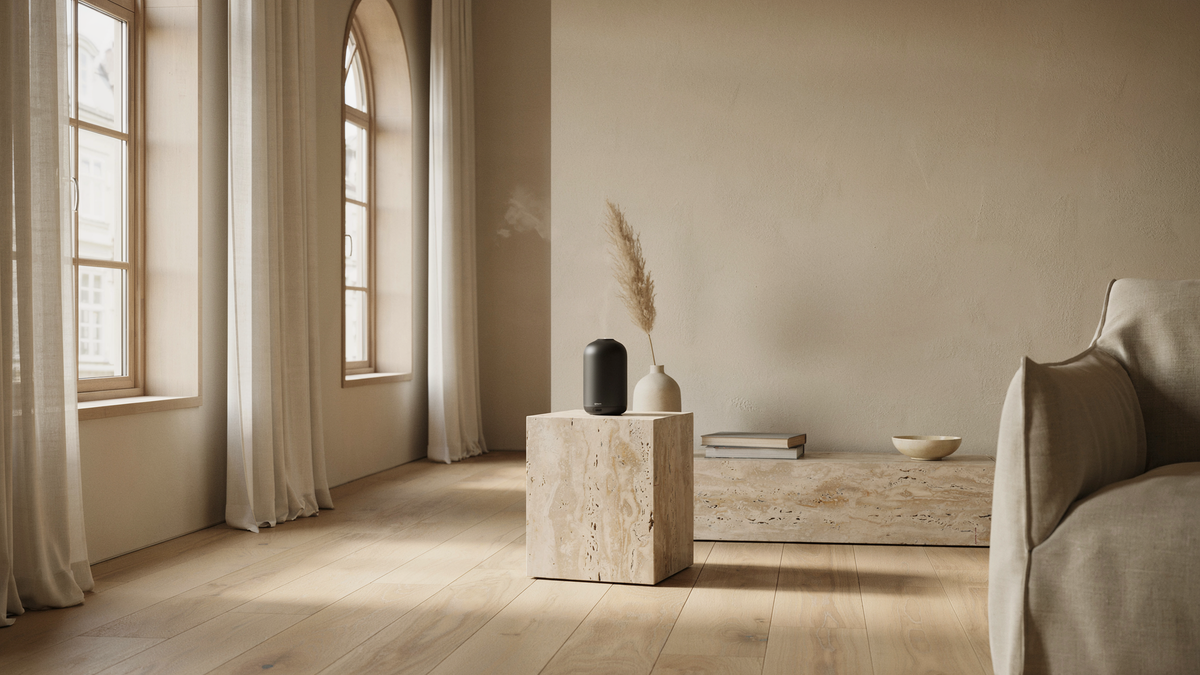 Waterless scent diffuser in a warm, refined living room.